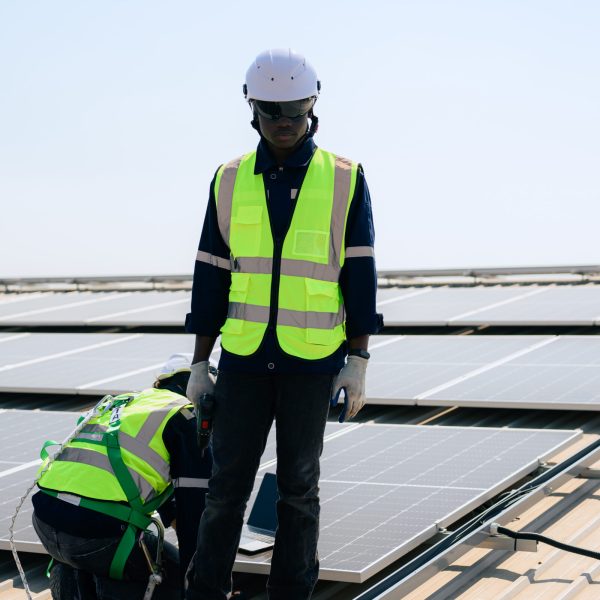 Professional engineer technician with safety helmet checking system. High quality photo